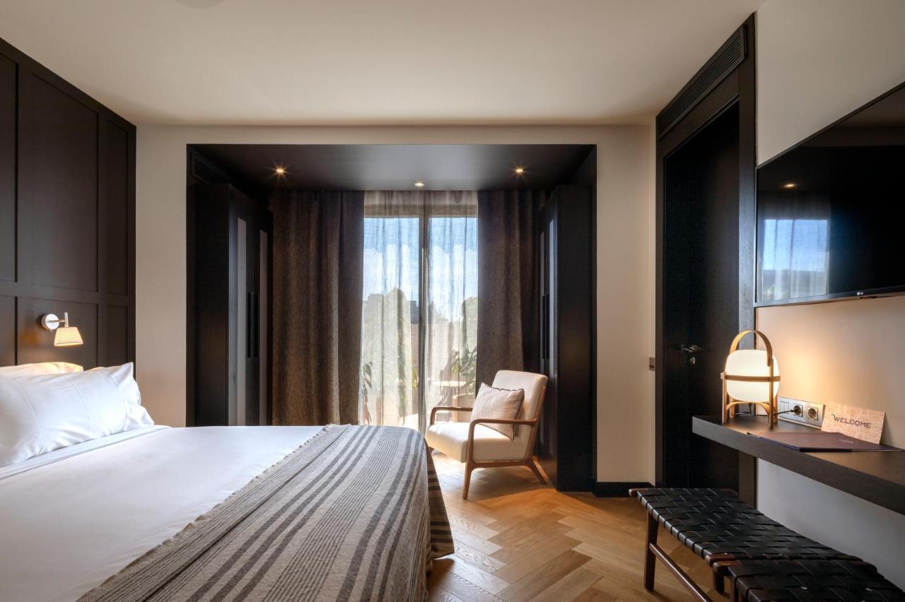 Hotel Casa Sagnier Barcelona Exterior photo A bedroom at the hotel