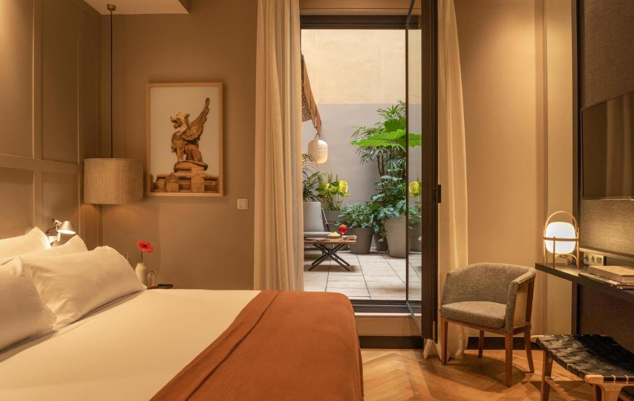 Hotel Casa Sagnier Barcelona Exterior photo A room at the hotel